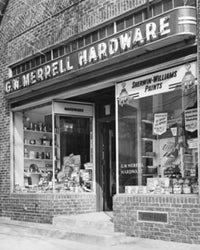 Facade of a Hardware Store Poster Print showcasing urban charm.