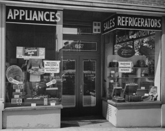 Appliances in a window display poster print showcasing modern electronics.