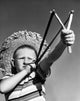 Boy Aiming Slingshot Poster Print showcasing childhood adventure