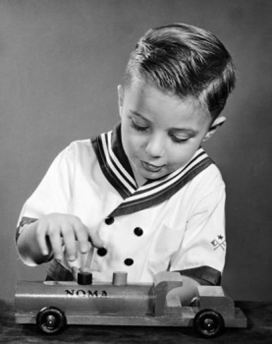 Boy Playing with a Toy Truck Poster Print