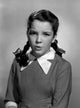 Studio portrait of teenage girl poster print showcasing youthful beauty.