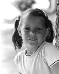 Portrait of a girl smiling outdoors poster print