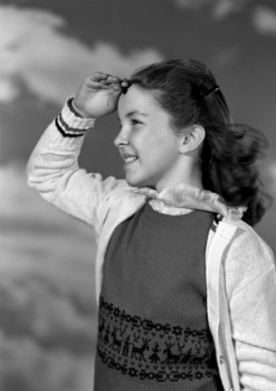 Girl looking up at clouds poster print