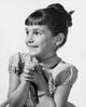 Close-Up of a Girl Smiling Poster Print, showcasing joy and warmth.
