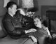 High angle view of a young couple sitting in a living room poster print.