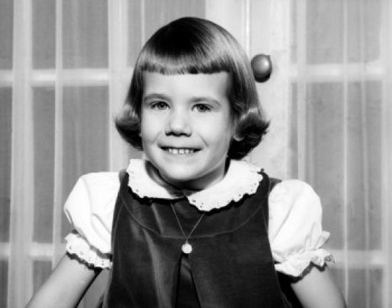 Portrait of a girl smiling indoors - cheerful poster print.