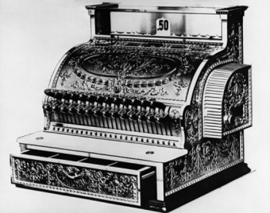 Close-up view of an antique cash register poster print.