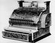 Close-up view of an antique cash register poster print.