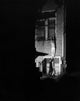 Vintage photograph of burglars breaking into a house