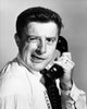 Close-up of a businessman using a telephone poster print.