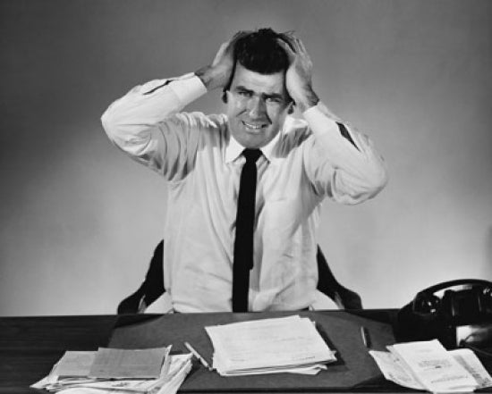Businessman Suffering from a Headache Poster Print showcasing the stress of the modern workplace.