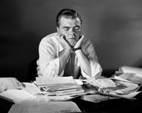 Businessman Sleeping in an Office Poster Print, perfect for office decor.