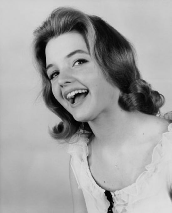 Portrait of a Young Woman Laughing Poster Print showcasing joy and happiness.