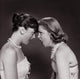 Two Teenage Girls Fighting Poster Print showcasing dynamic youth emotion.