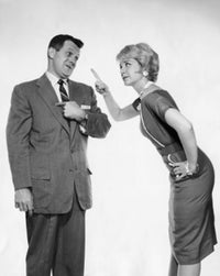 Poster print of a young woman pointing at a young man, side profile view.