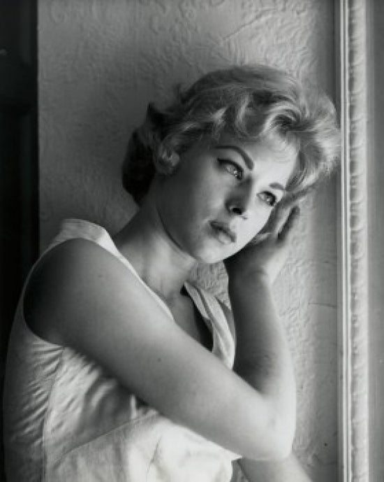 Close-up poster print of a teenage girl in contemplative thought.