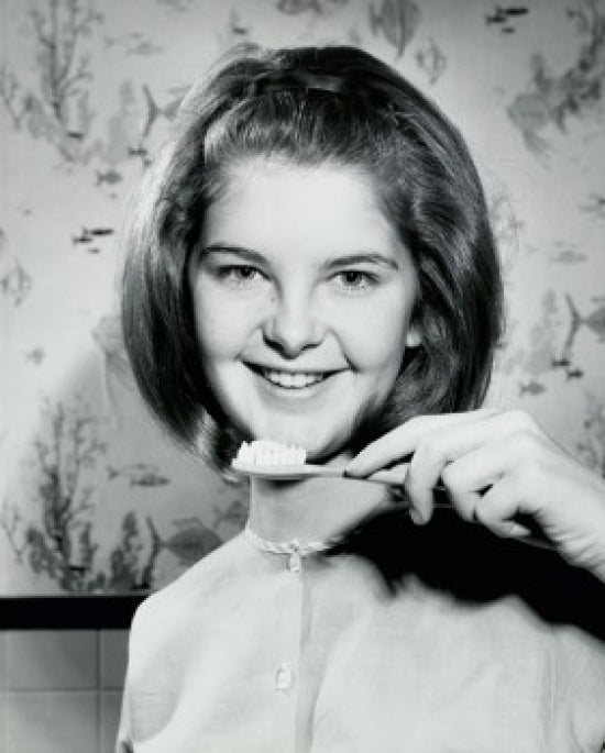 1966 Portrait of a Teenage Girl Holding a Toothbrush Poster Print