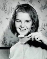1966 Portrait of a Teenage Girl Holding a Toothbrush Poster Print