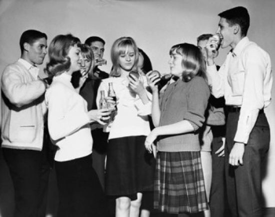 Teenagers enjoying food at a party poster print