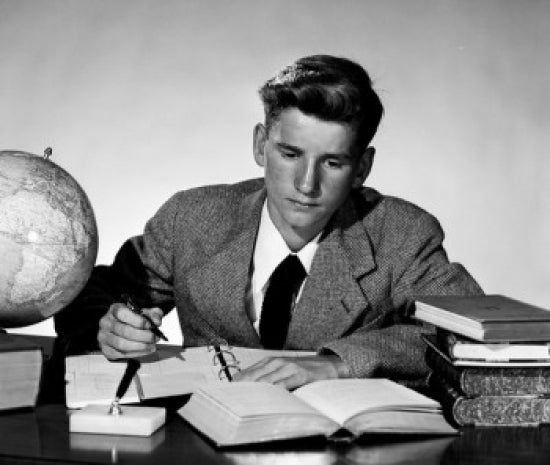University Student Studying for Exam Poster Print showcasing academic determination.