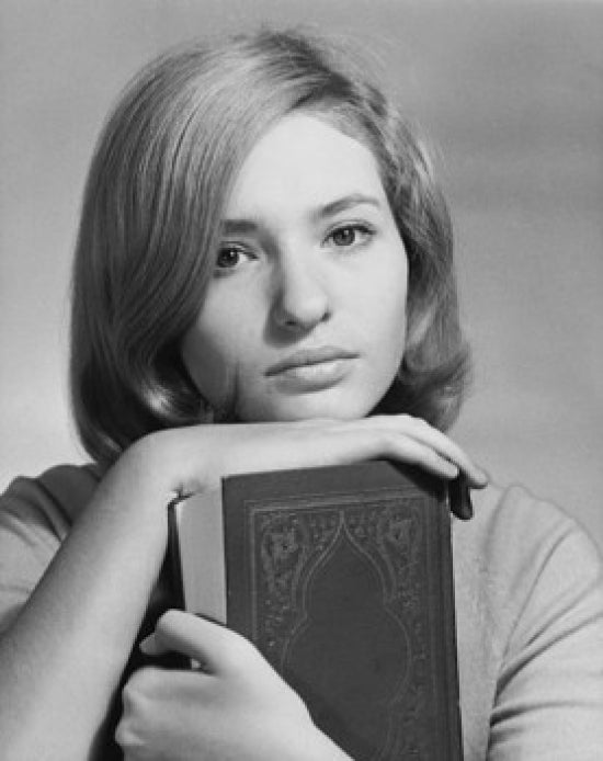 Poster print of a serious teenage girl holding a book