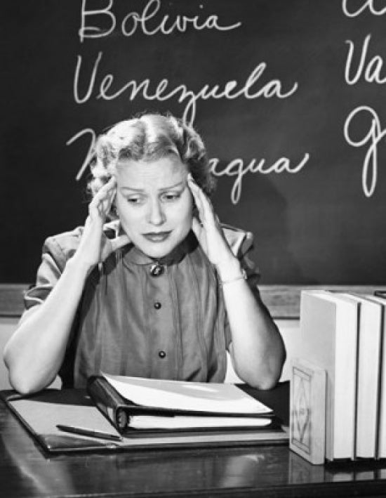 Stressed teacher in classroom poster print