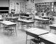 Empty Chairs in a Classroom Poster Print