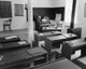Empty Desks in a Classroom Poster Print capturing the essence of learning.