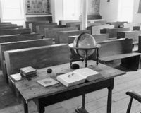Globe and Books in an Empty Classroom Poster Print, educational art.