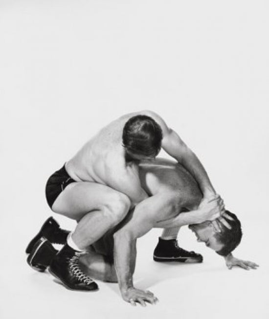 Two Young Men Wrestling Poster Print showcasing athletic competition.