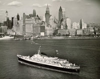 High angle view of SS Flandre cruise ship approaching Manhattan skyline