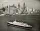 High angle view of SS Flandre cruise ship approaching Manhattan skyline