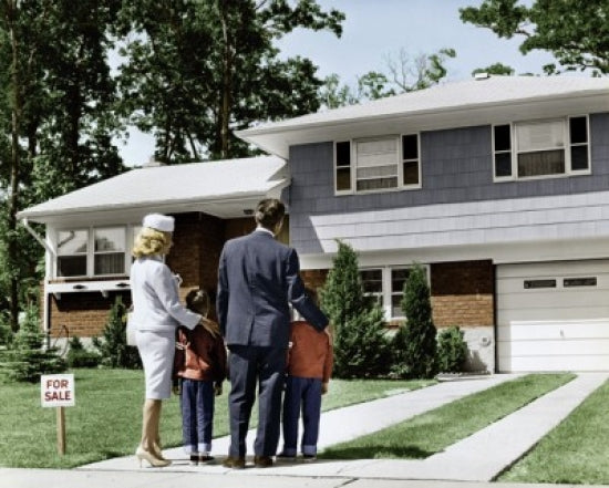Rear view of parents with children in front of a house poster print.