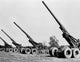 Howitzers in a Field 155mm Howitzer M1A1 Poster Print from 1942, detailed military artwork.