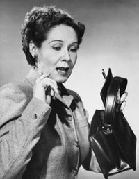 Close-up of a mature woman holding a handbag poster print.