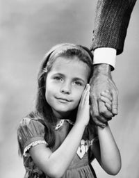Close-up of a girl holding her father's hand poster print.