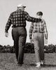 Grandfather and grandson walking in a park poster print