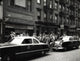 New York City Police Officers Poster Print showcasing a group of law enforcement on the street.