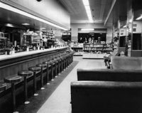 Interior of an Empty Restaurant poster print showcasing tranquil decor.