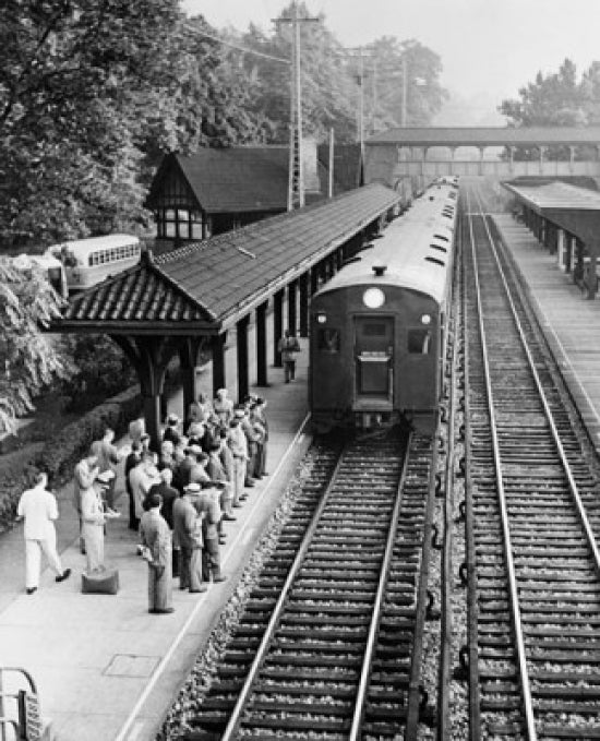 High angle view of passengers waiting on a railroad station platform in New York, USA