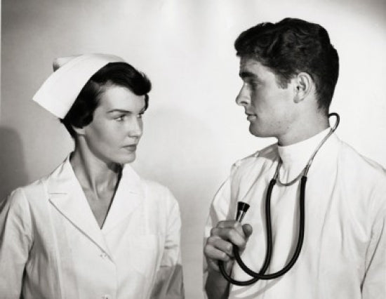 Doctor and Nurse Interaction Poster Print showcasing compassion in healthcare.
