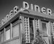 Low angle view of diner sign poster print showcasing vintage Americana style.