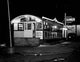 Little Diner on Street Corner Poster Print showcasing classic diner charm.