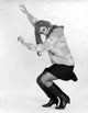 Side profile poster print of a young woman dancing, capturing grace and movement.