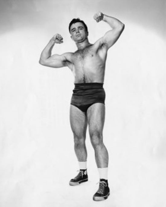 Portrait of a Young Man Flexing His Muscles Poster Print