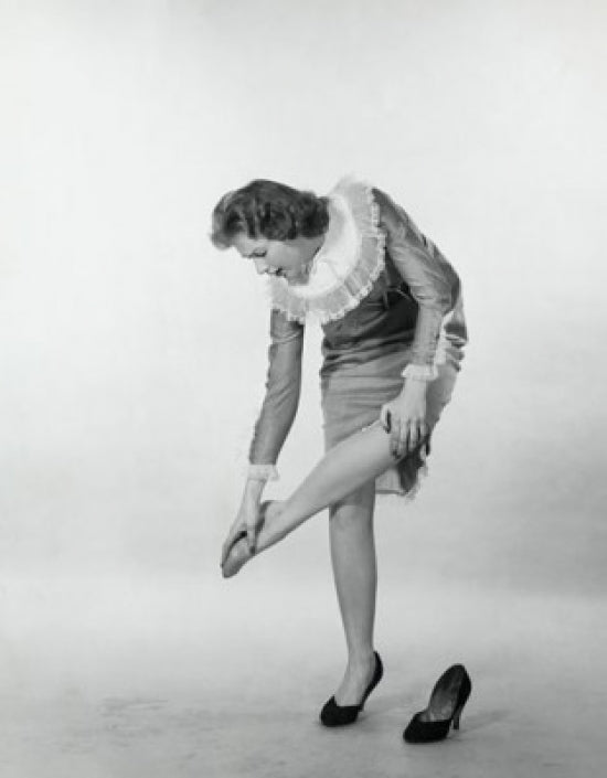 Young Woman Touching Her Ankle Poster Print