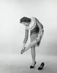 Young Woman Touching Her Ankle Poster Print