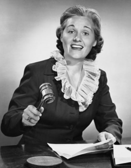 Female Judge Holding a Gavel Poster Print showcasing justice