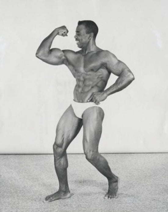 Male bodybuilder flexing muscles poster print showcasing strength and fitness inspiration