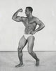 Male bodybuilder flexing muscles poster print showcasing strength and fitness inspiration